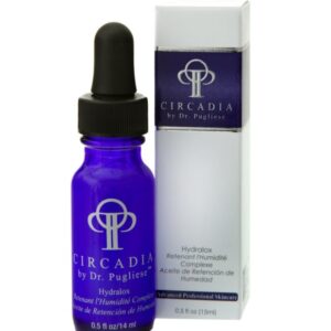 A bottle of serum next to its box.